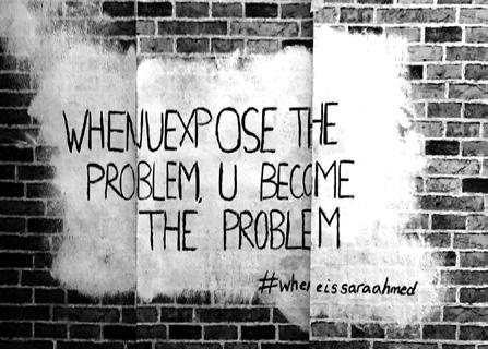 Photo d’un mur avec l’inscription "`when you expose the problem